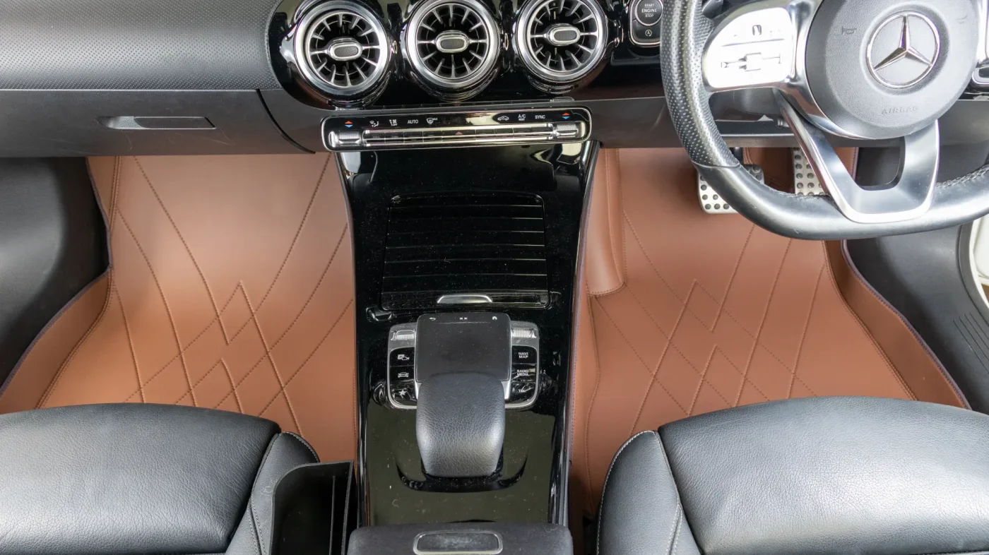 Car Mat Materials Compared: Coil, Rubber, TPE & Leather